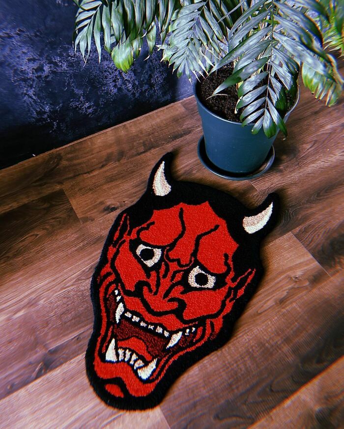 Colorful demon face rug
