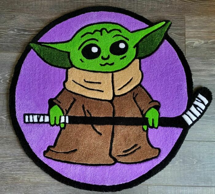 Baby Yoda with hockey stick rug