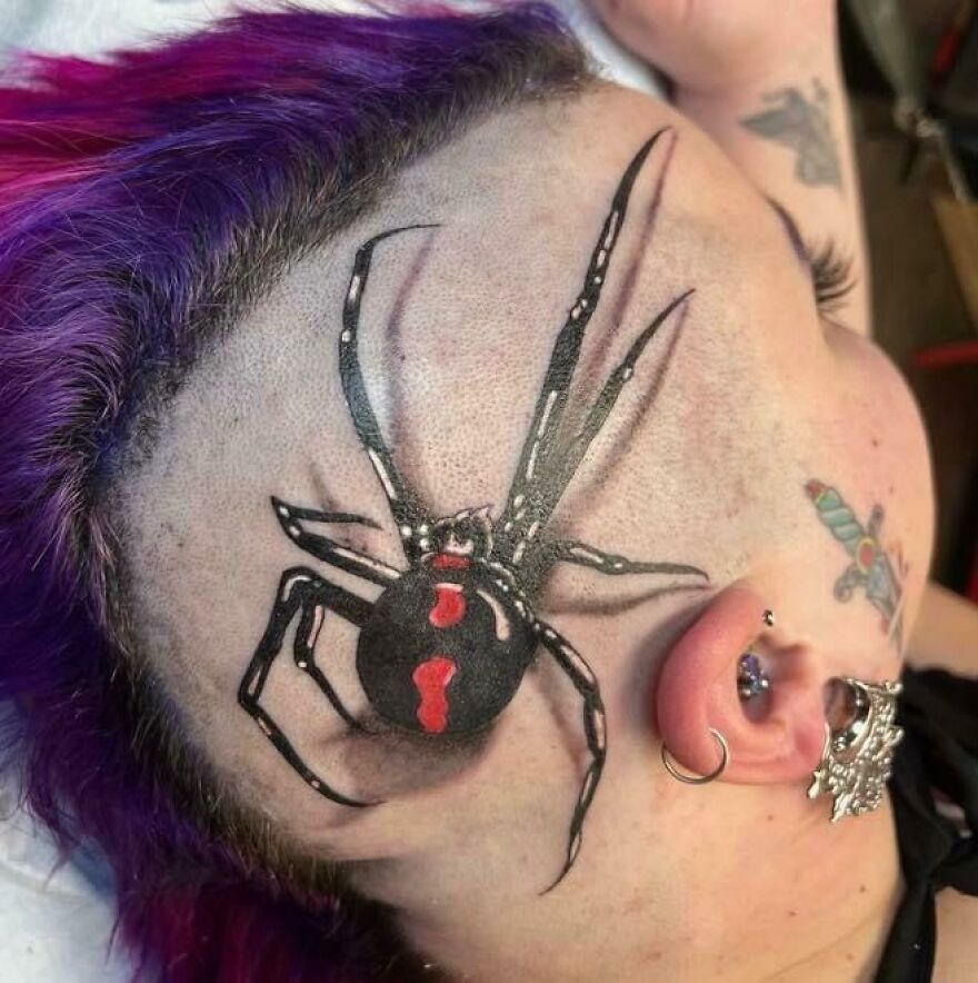 Dark realistic spider tattoo on head