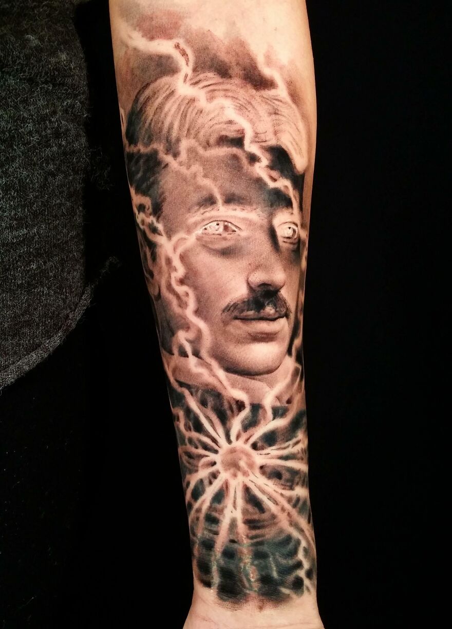 Tesla portrait tattoo on arm