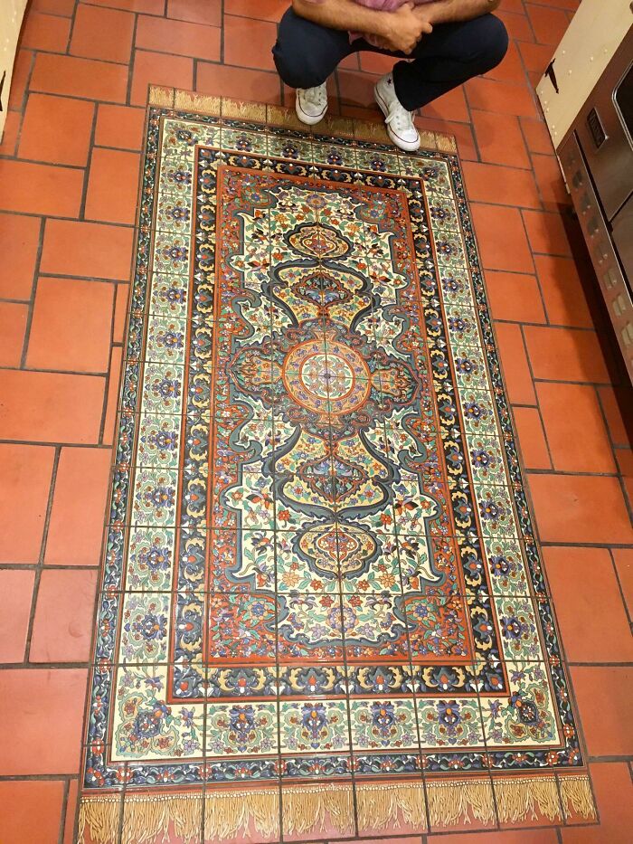 Colorful mosaic tiled rug in kitchen