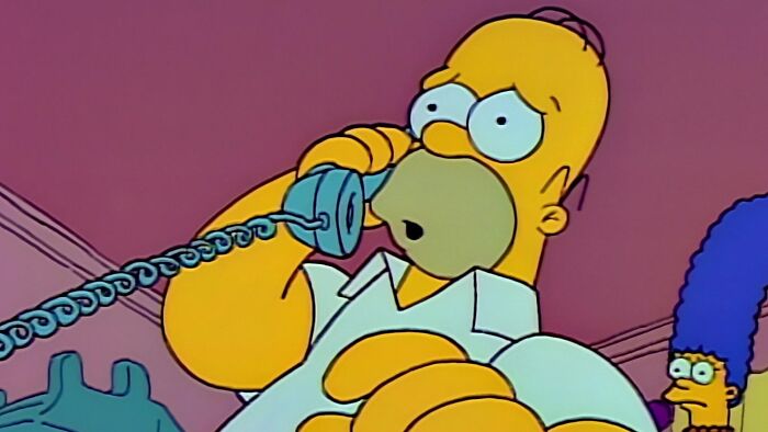 Homer is talking on the phone 