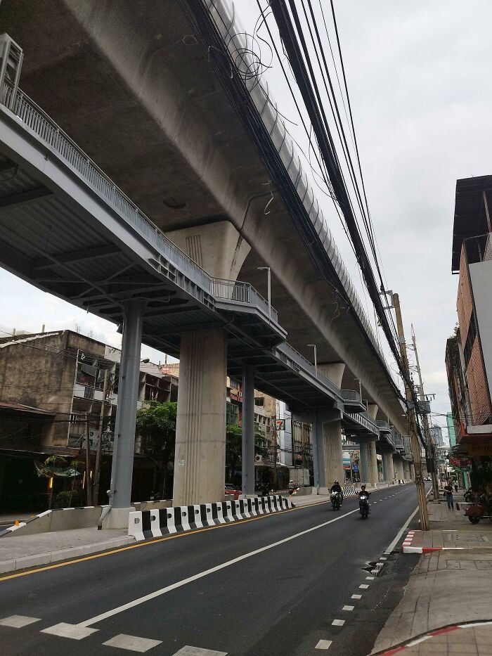 Pedestrian Walkway Under The Subway Viaduct. Bangkok