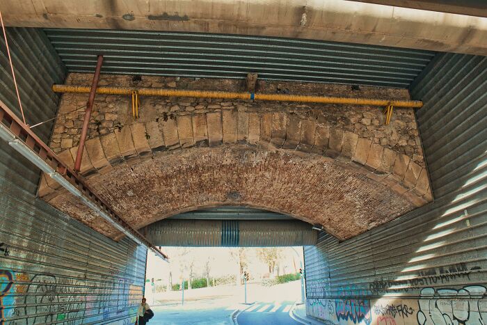 Old Bridge Hidden Under The New One. Barcelona, Spain