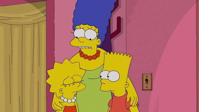 Marge hugging Bart and Lisa 