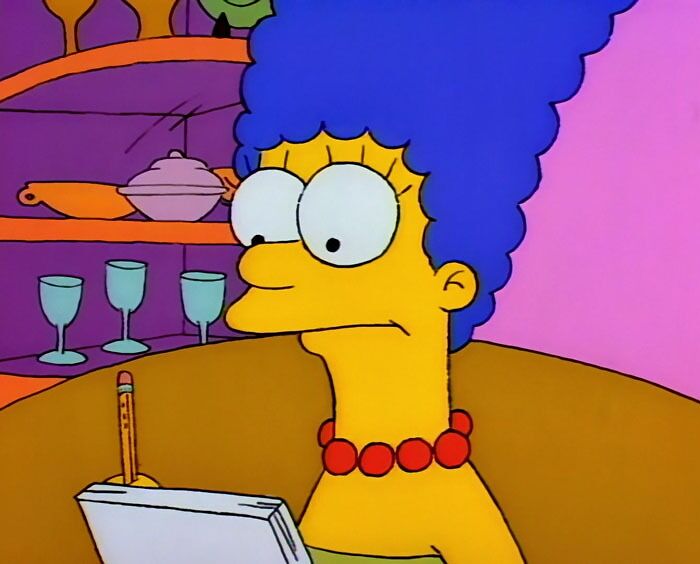 Marge writing something down 