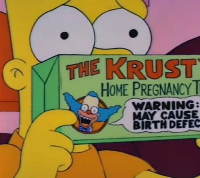 Bart holding the Krusty home pregnancy test