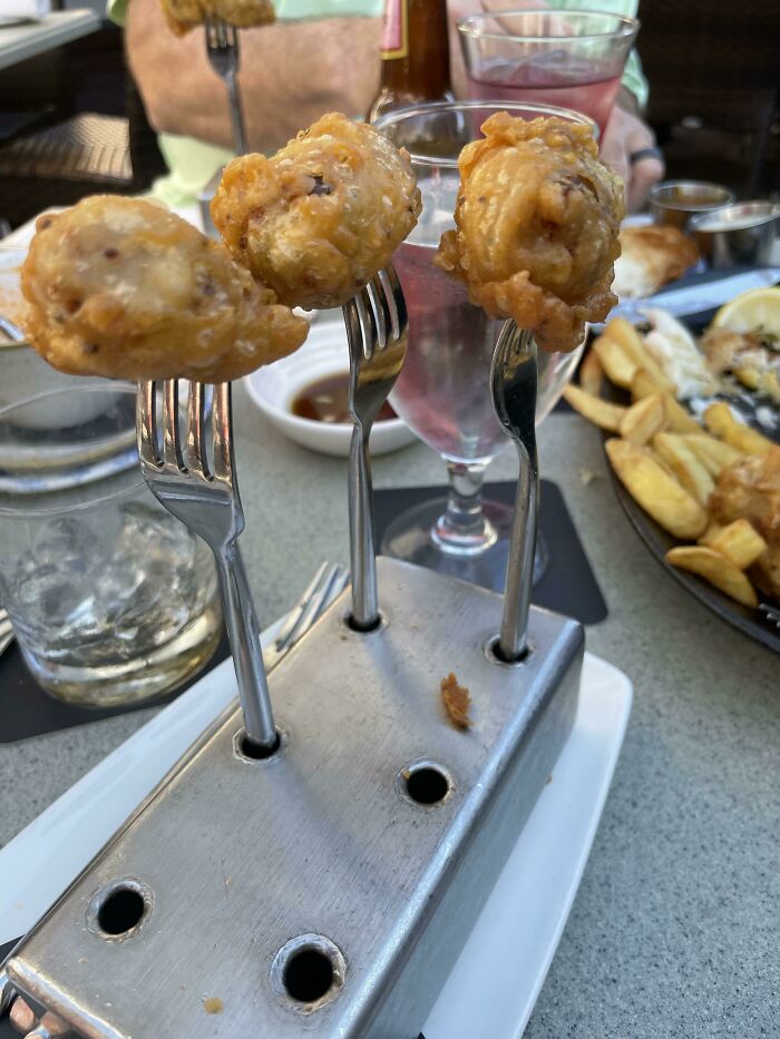 Fried Sausages Served On Individual Forks Sticking Out Of A Metal Brick - Raglan Road Irish Pub At Disney Springs