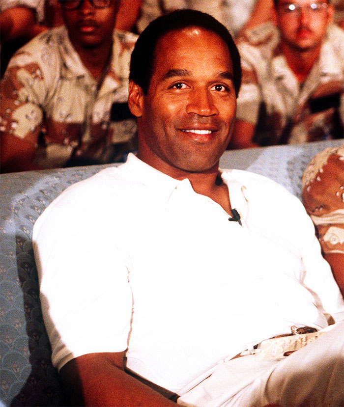 Picture of O. J. Simpson sitting and smiling