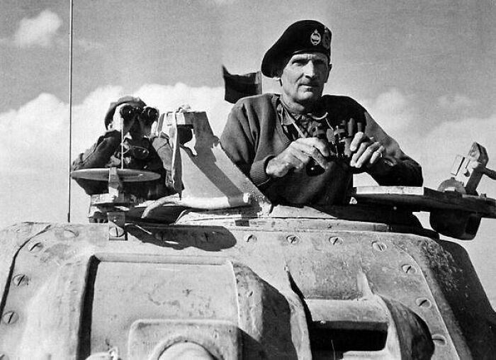 Britain's General Bernard Montgomery, Commander Of The Eighth Army, Watches Battle In Egypt's Western Desert From The Turret Of An M3 Grant Tank In 1942
