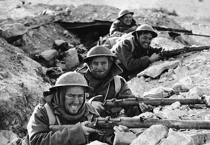 Pictured Above Are British Infantrymen In Position In A Shallow Trench Near Bardia, A Libyan Port