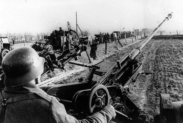 A German Soldier Operates His Antiaircraft Gun At An Unknown Location In Support Of The German Troops As They March Into Danish Territory On April 9, 1940