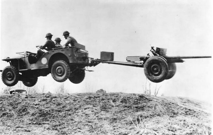 Pictured Above Is A Bantam Jeep, Towing A 37mm Gun M3 Piece Getting Some Airtime Near New River, North Carolina During 1941