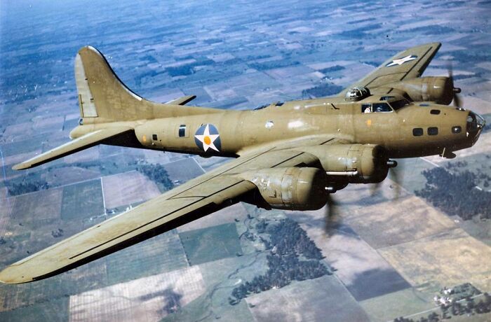 Pictured Above Is An American B-17e Flying Fortress Bomber In Flight During 1942