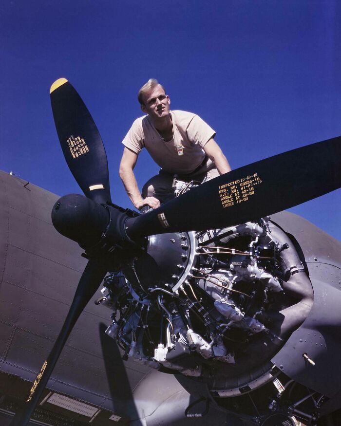 Pictured Above Is A Douglas Aircraft Company Employee Working On The Port Engine Of A C-47 Skytrain Aircraft In Long Beach California During October Of 1942