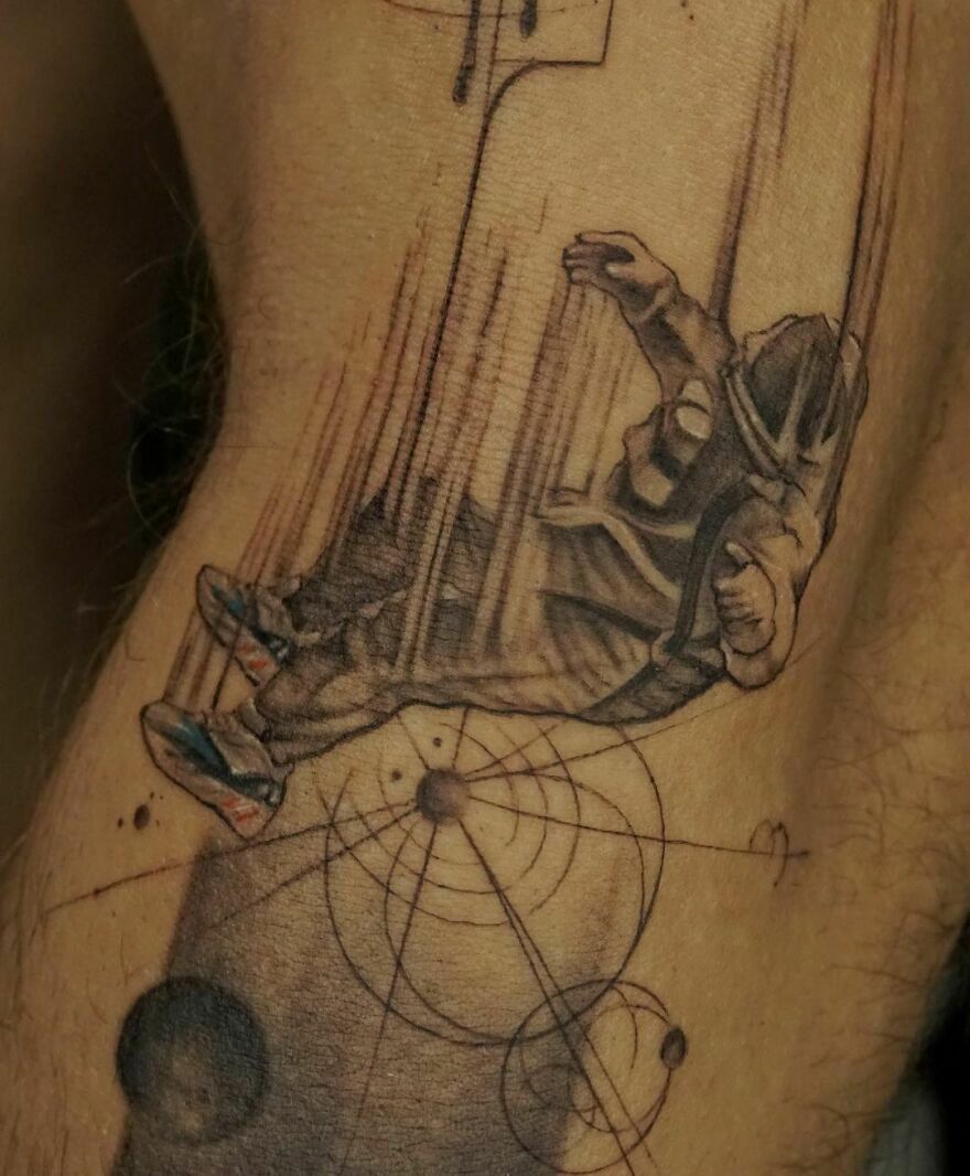 Falling astronaut tattoo