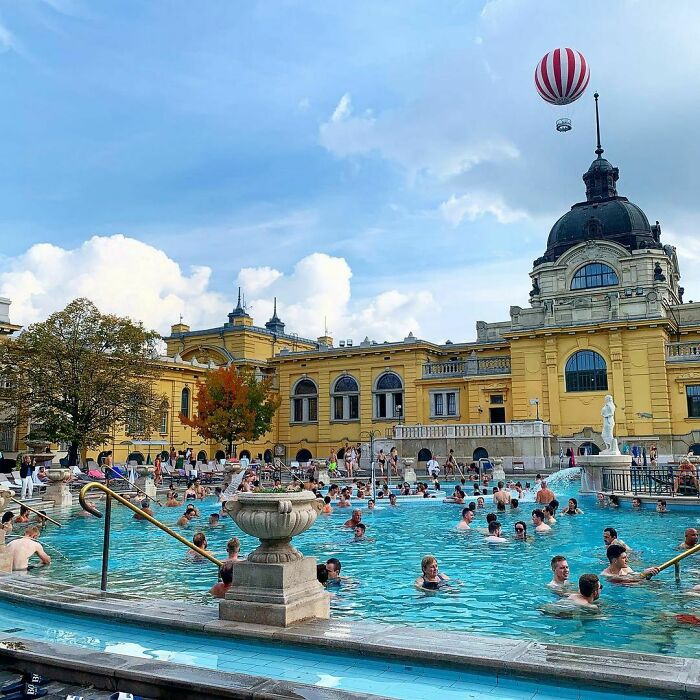 Big public city pool with people inside