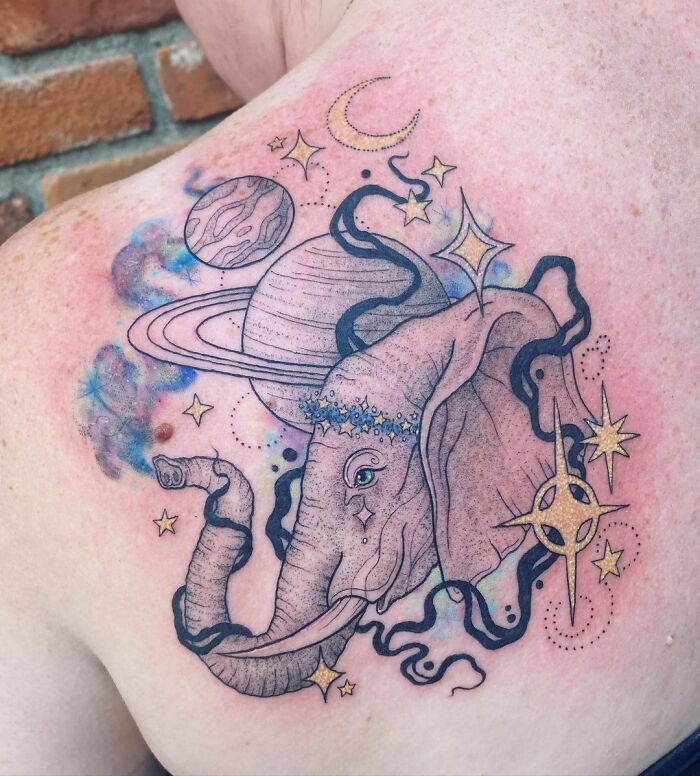 Elephant in the stars back tattoo