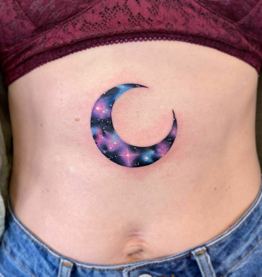 Galaxy moon belly tattoo