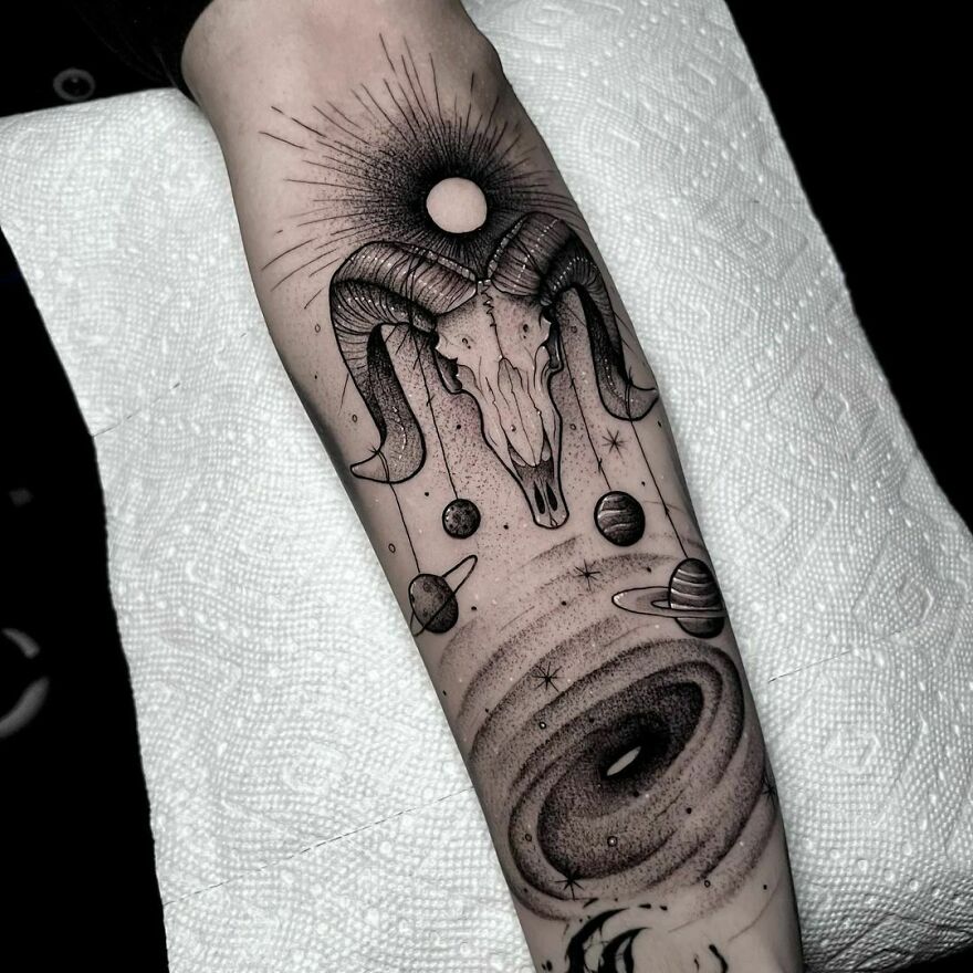 Space ram forearm tattoo