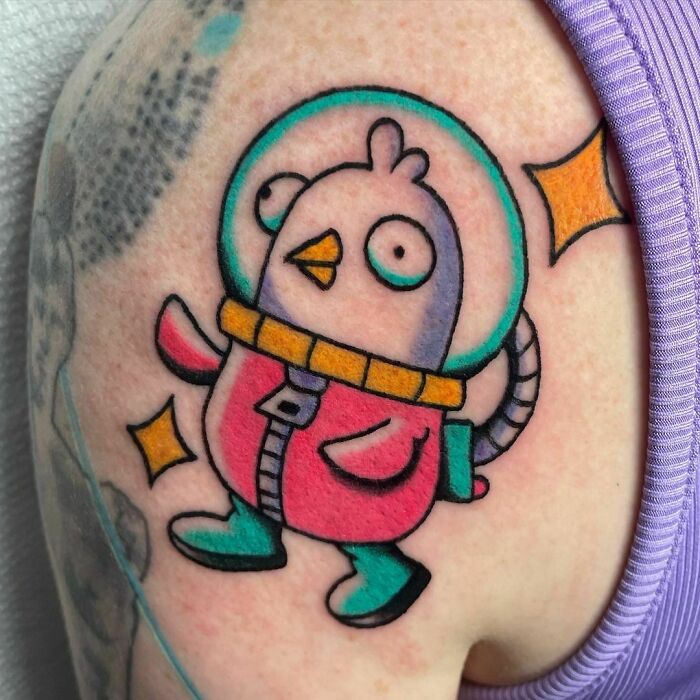 Space chicken shoulder tattoo