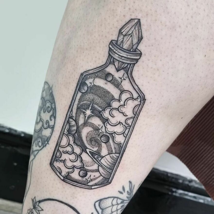 Potion bottle with space in it tattoo