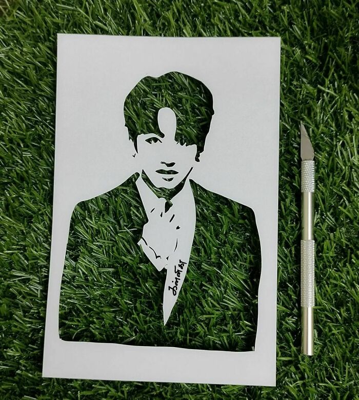 a portrait card on the grass