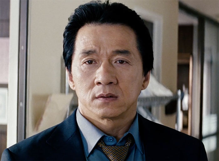 Jackie Chan wearing suit in movie Rush Hour