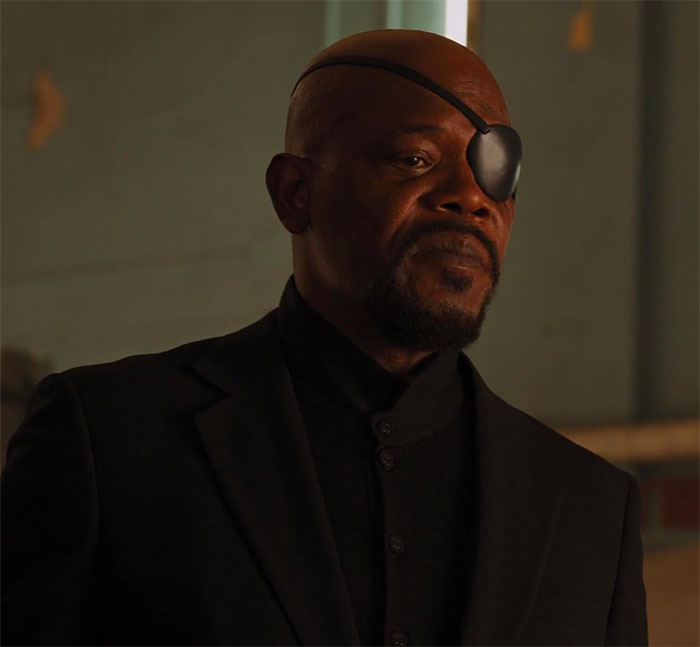 Samuel L Jackson wearing black clothes and looking in movie Avengers