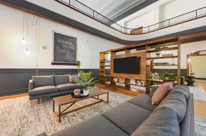 It took three years to transform an abandoned 1929 school building into this 31-family home