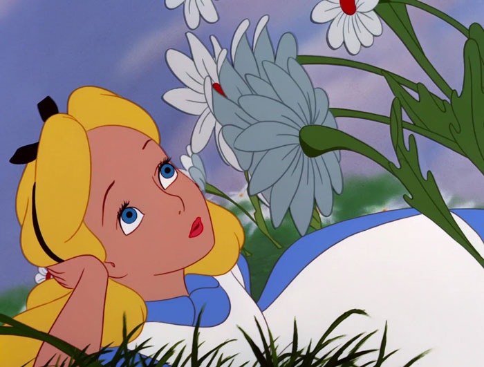 Cartoon character in a blue dress lying in a field of flowers, gazing thoughtfully at the sky.
