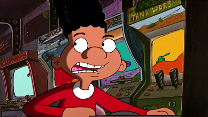 Cartoon character playing arcade games, embodying relatable life situations.