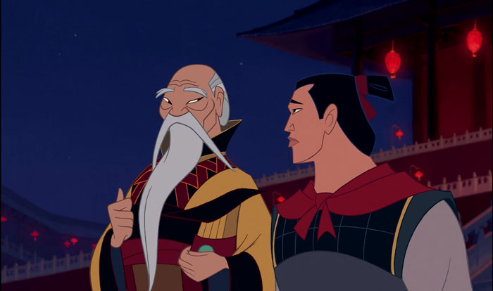 Two animated characters from a cartoon stand talking against a nighttime backdrop of traditional buildings and lanterns.