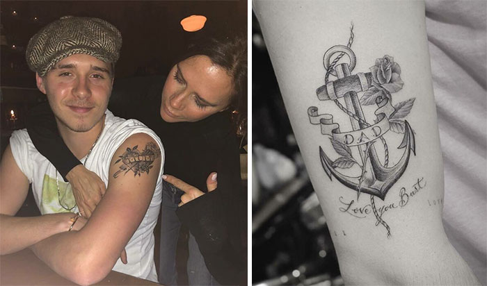 Two people admire a tattoo of a ship, with a close-up of an anchor tattoo labeled "Dad" with roses.