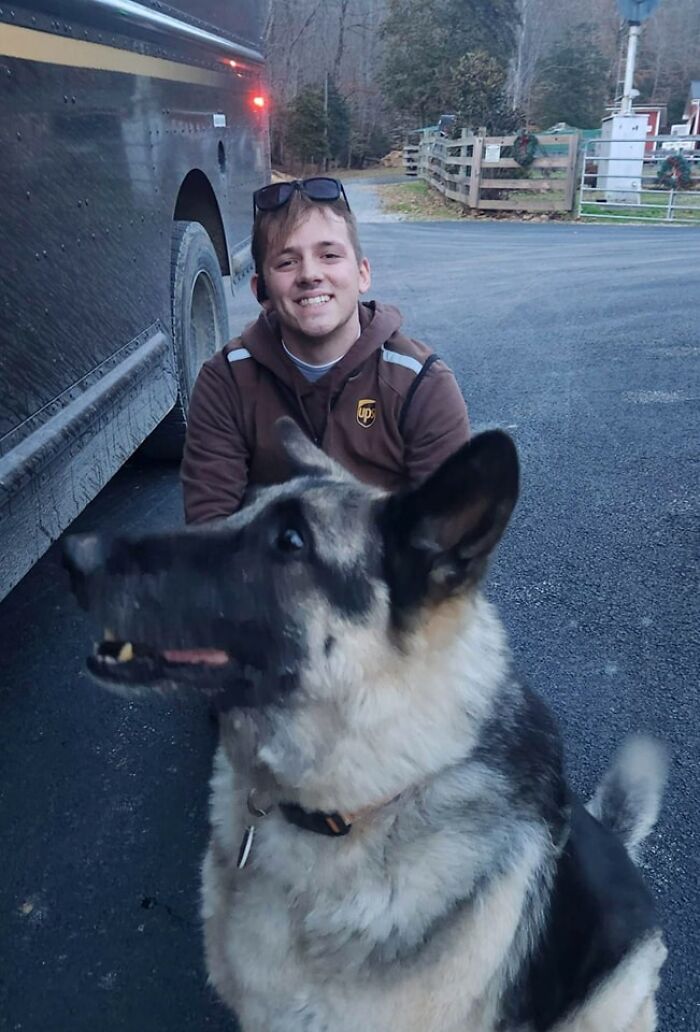 Our 12 Year Old German Shepherd, Schultz With Our UPS Driver, Dylan. Mendota, Va