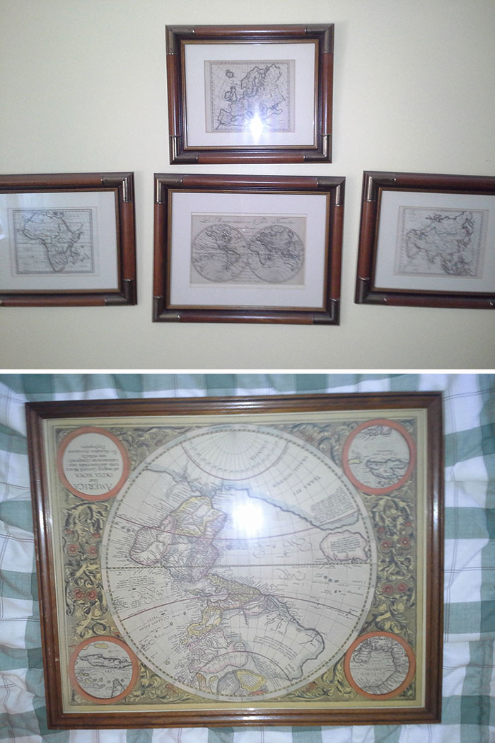 Framed maps hanging on the wall 