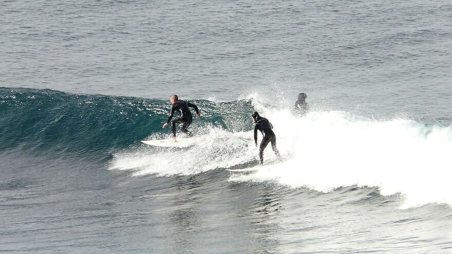 Two Bells beach surfers in water