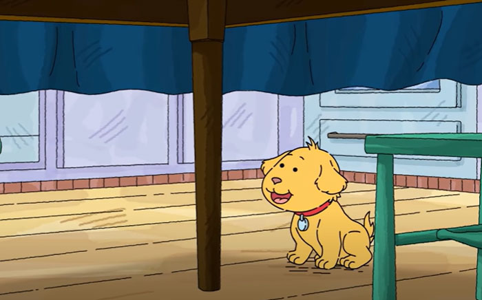 Cartoon dog sitting under a table, looking happy and curious in a colorful room.