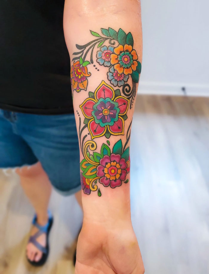Colorful mandala flowers tattoo