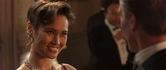 Tia Carrere looking at someone and smiling 