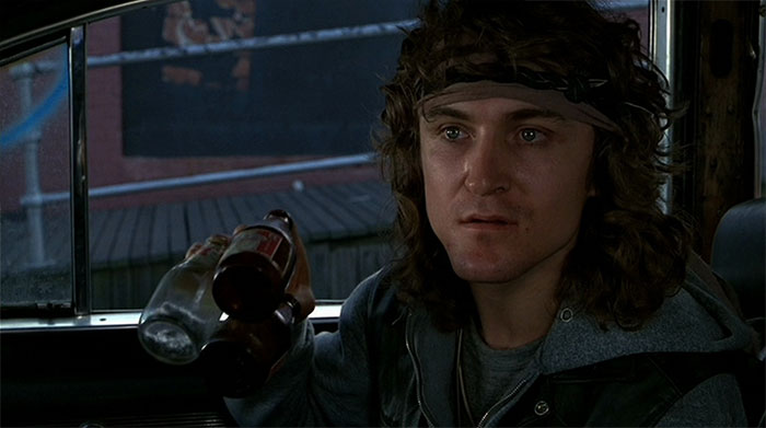 David Patrick Kelly drinking in a car 