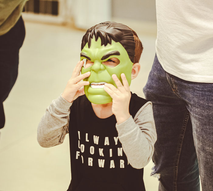 Kid With A Hulk Mask On His Face 