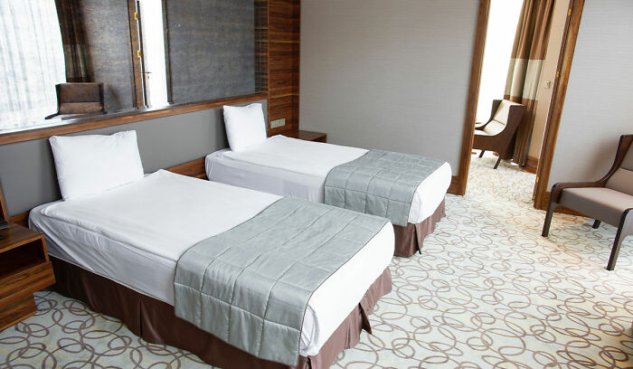 Two separate beds in hotel room