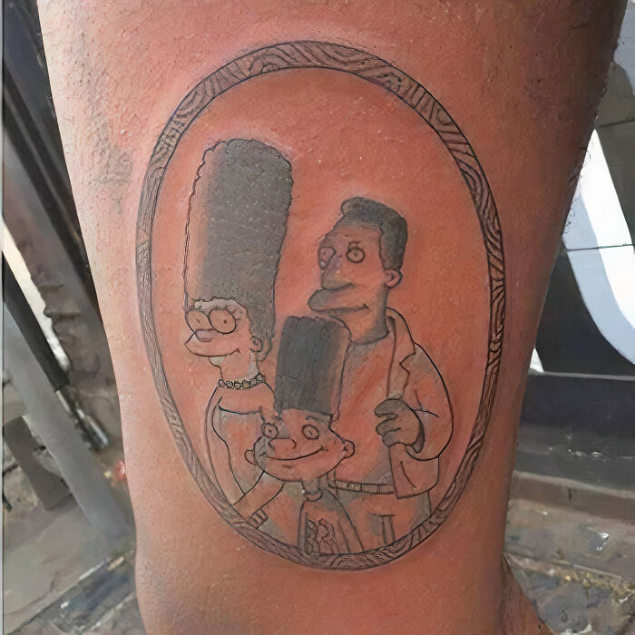 Comic-style funny tattoo of a cartoon family portrait.