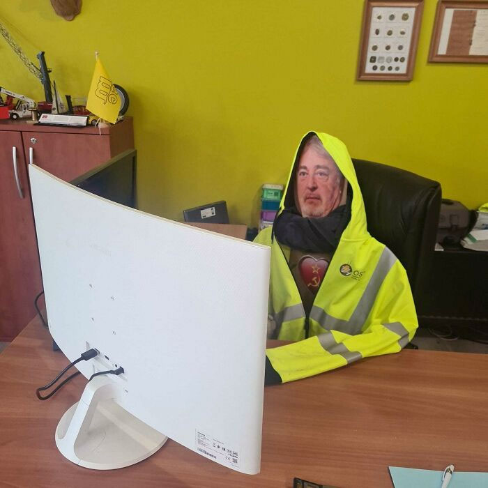 We Have A Cutout Of Our Boss At The Office For When He Works Abroad