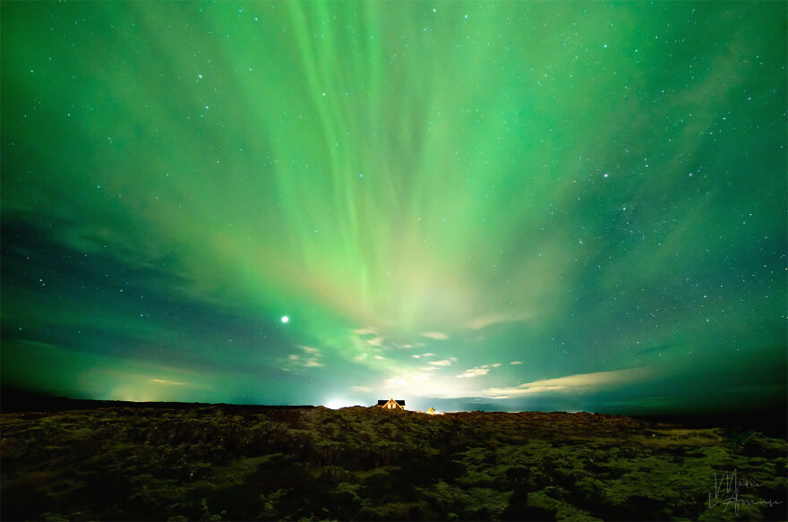Northern Lights Above A Cabin Lost In The Middle Of A Lava Field, Iceland