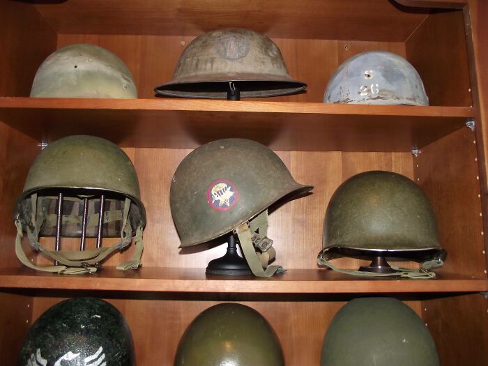 Military helmets on the shelf 