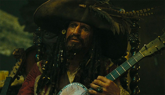 Keith Richards playing with instrument in Pirates of the Caribbean: at World's End movie