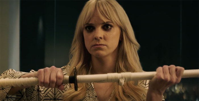 Anna Faris holding sword in movie Keanu