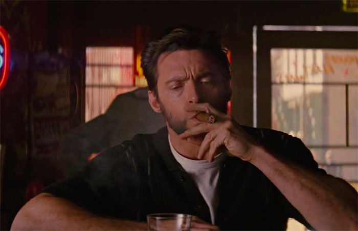 Hugh Jackman smoking and drinking in bar in movie X-Men: First Class